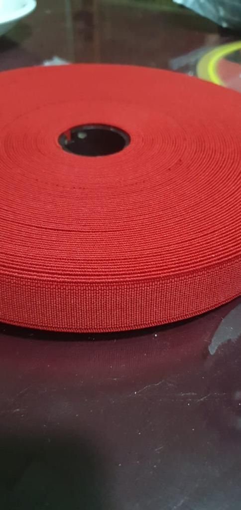 Red plain elastic roll in 25 metre standard packing